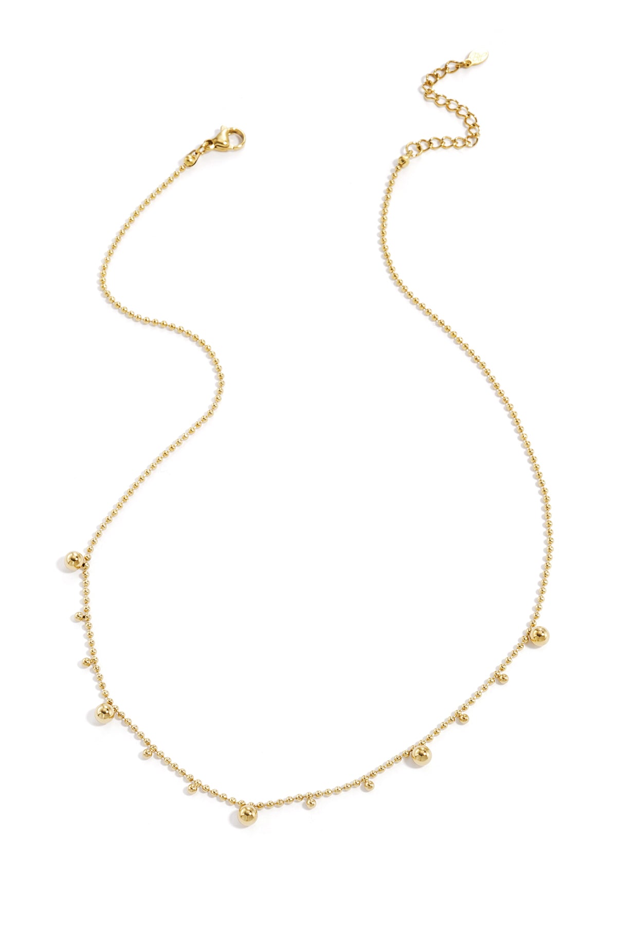 Necklace with alternating balls