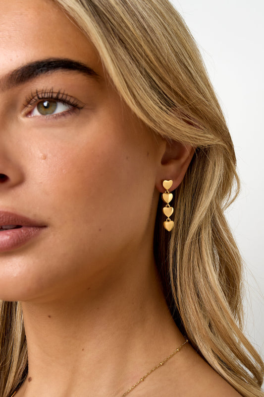 Row of heart earrings