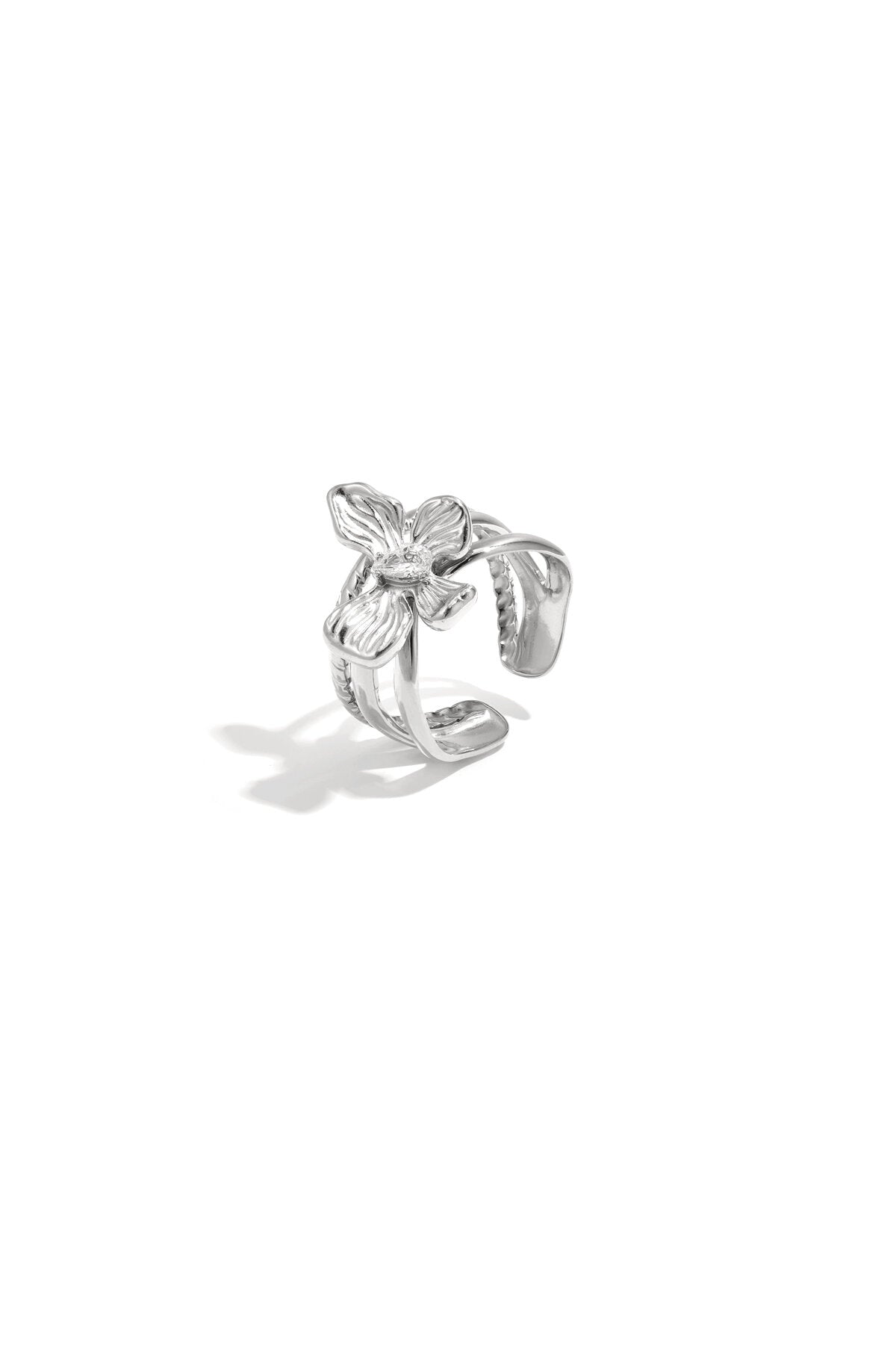 Layered statement ring with flower and stone